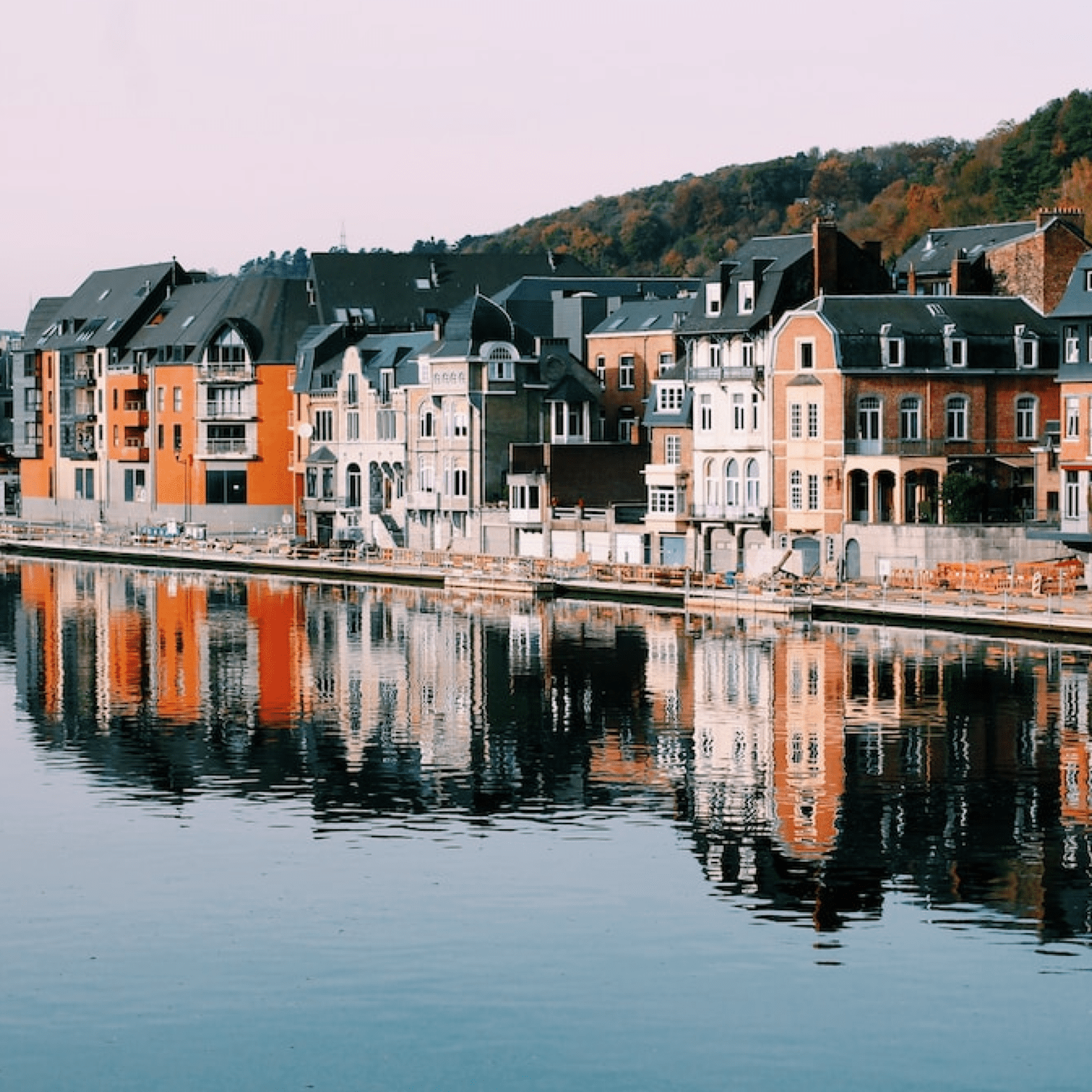 A wide view of a lakeside city in Europe